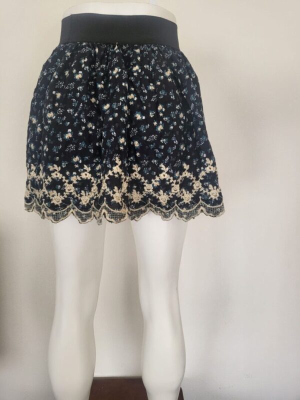 Forever 21 black mini circle skirt on display